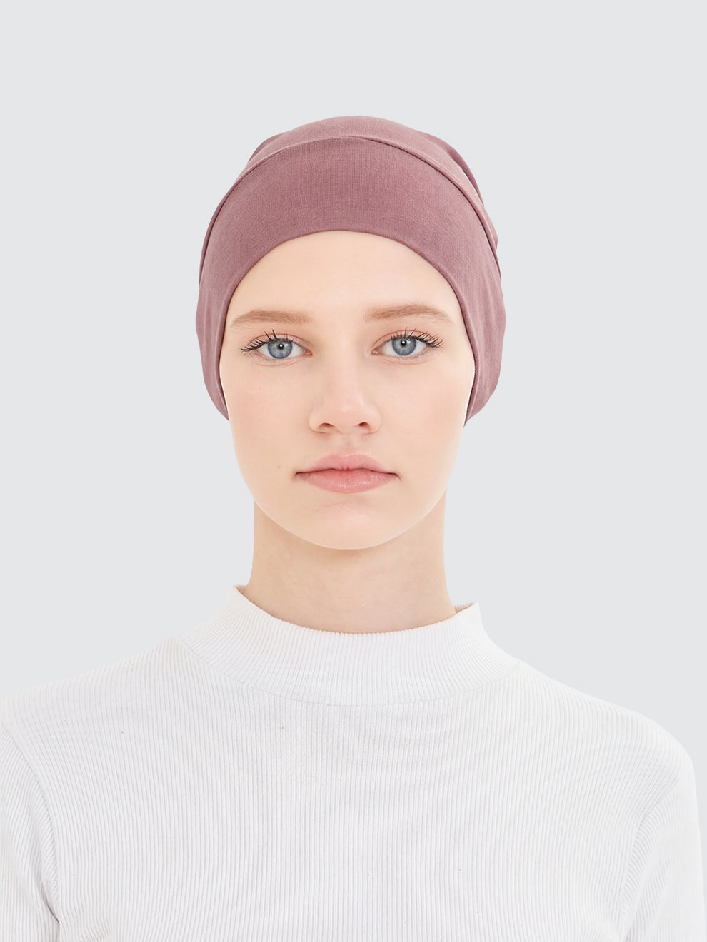 Imaarah dusty rose hijab undercap worn as soft breathable inner layer