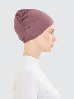 Imaarah dusty rose hijab undercap side view with lightweight flexible design