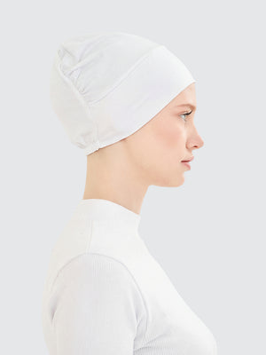 Imaarah white hijab undercap side view with clean neutral coverage