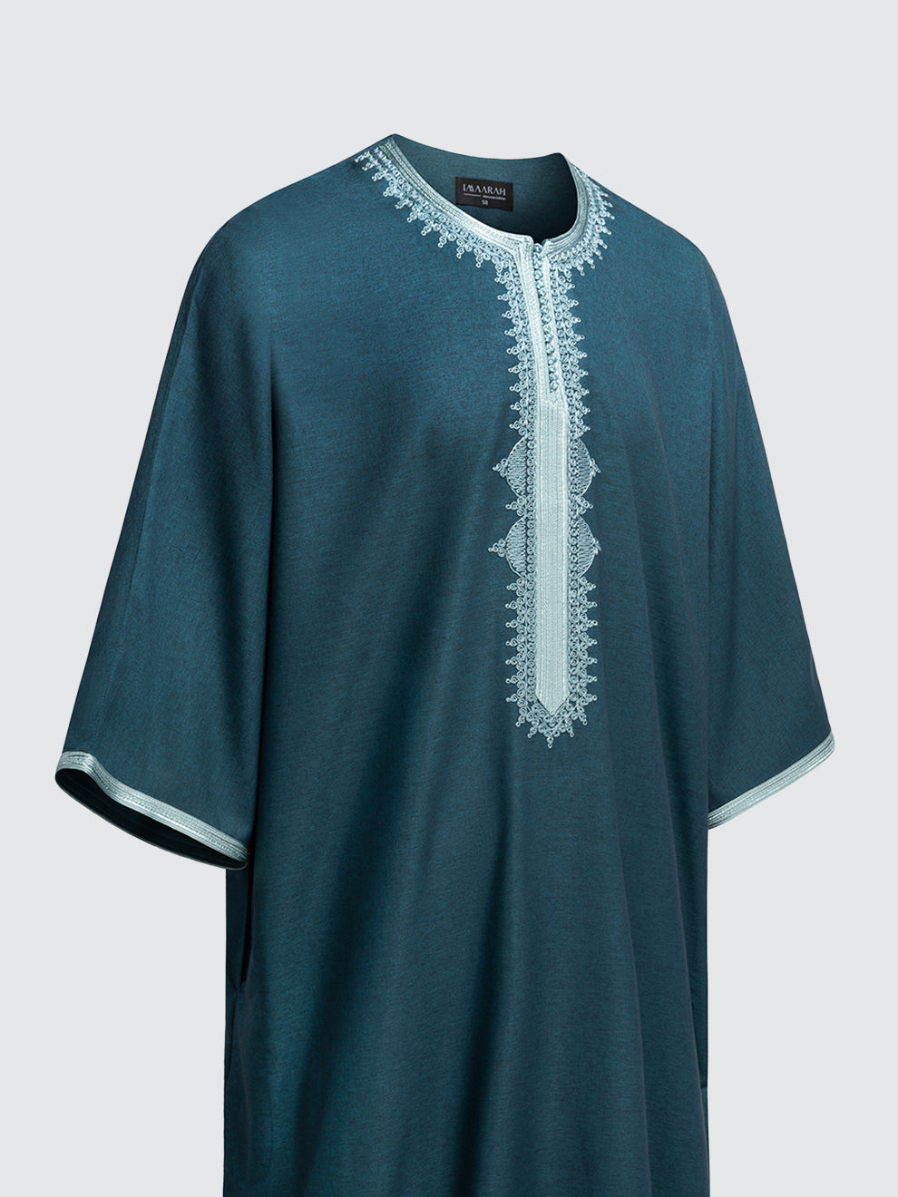 Emerald green Moroccan thobe with seafoam green embroidery – short sleeve side view