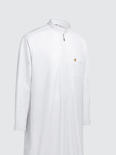 Luxury white Moroccan thobe featuring detailed imperial embroidery, refined long sleeve silhouette for formal Islamic wear and ceremonial occasions