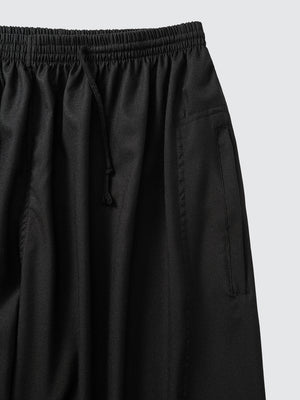 Close-up of Imaarah Andalus black pants waistband with elasticated waist and adjustable drawstring for comfort