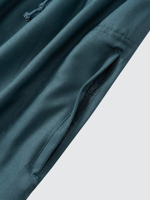 Zip side pocket detail on emarald green Moroccan thobe pants