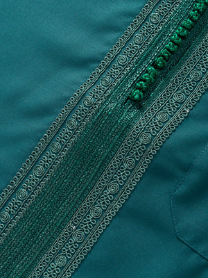 Close-up of emerald green Moroccan thobe embroidery with textured placket and traditional detailing