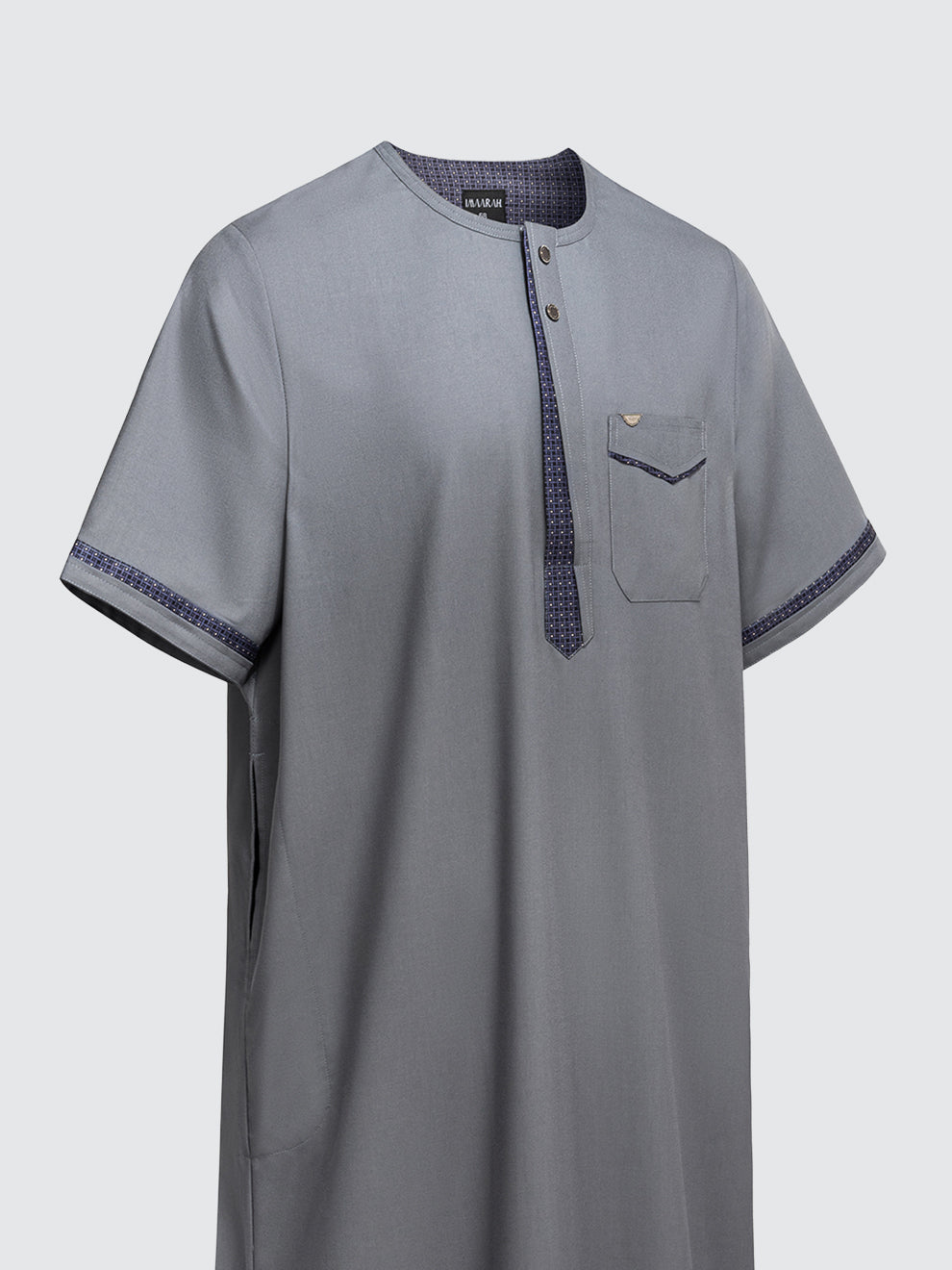 Imaarah Vantage grey short sleeve thobe angled view showing modern relaxed fit