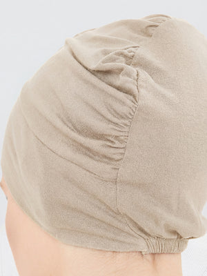 Imaarah sand beige hijab undercap fabric detail showing soft breathable viscose texture