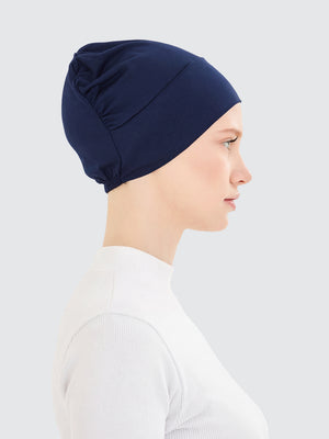 Imaarah navy hijab undercap side view made from viscose lycra blend