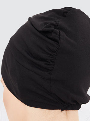 Imaarah black hijab undercap detail showing breathable fabric and stitching