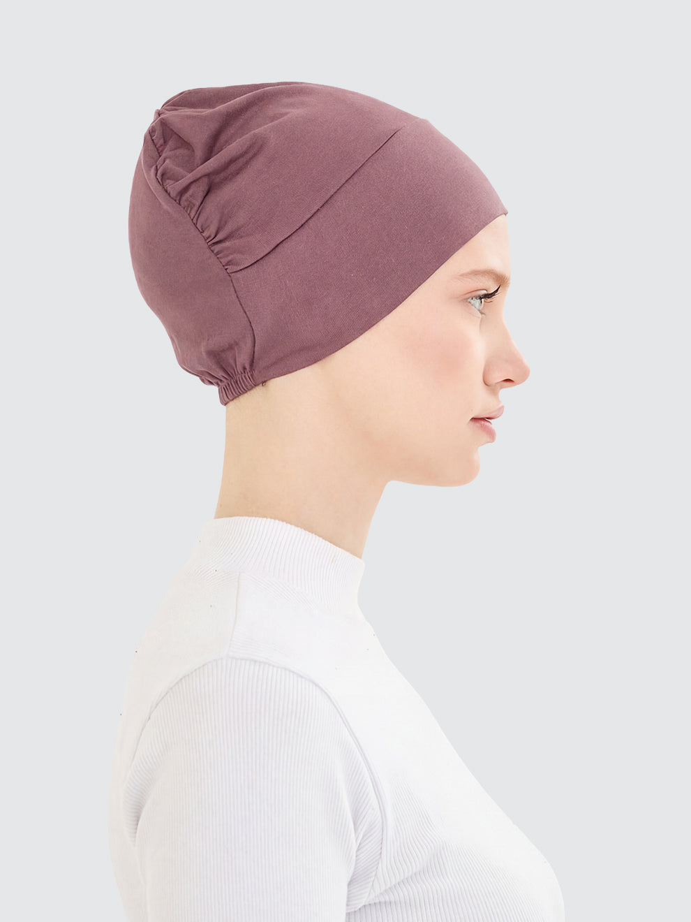 Imaarah dusty rose hijab undercap side view with lightweight flexible design