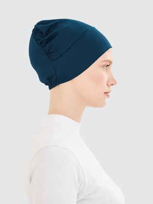 Imaarah teal hijab undercap side view with flexible lightweight design