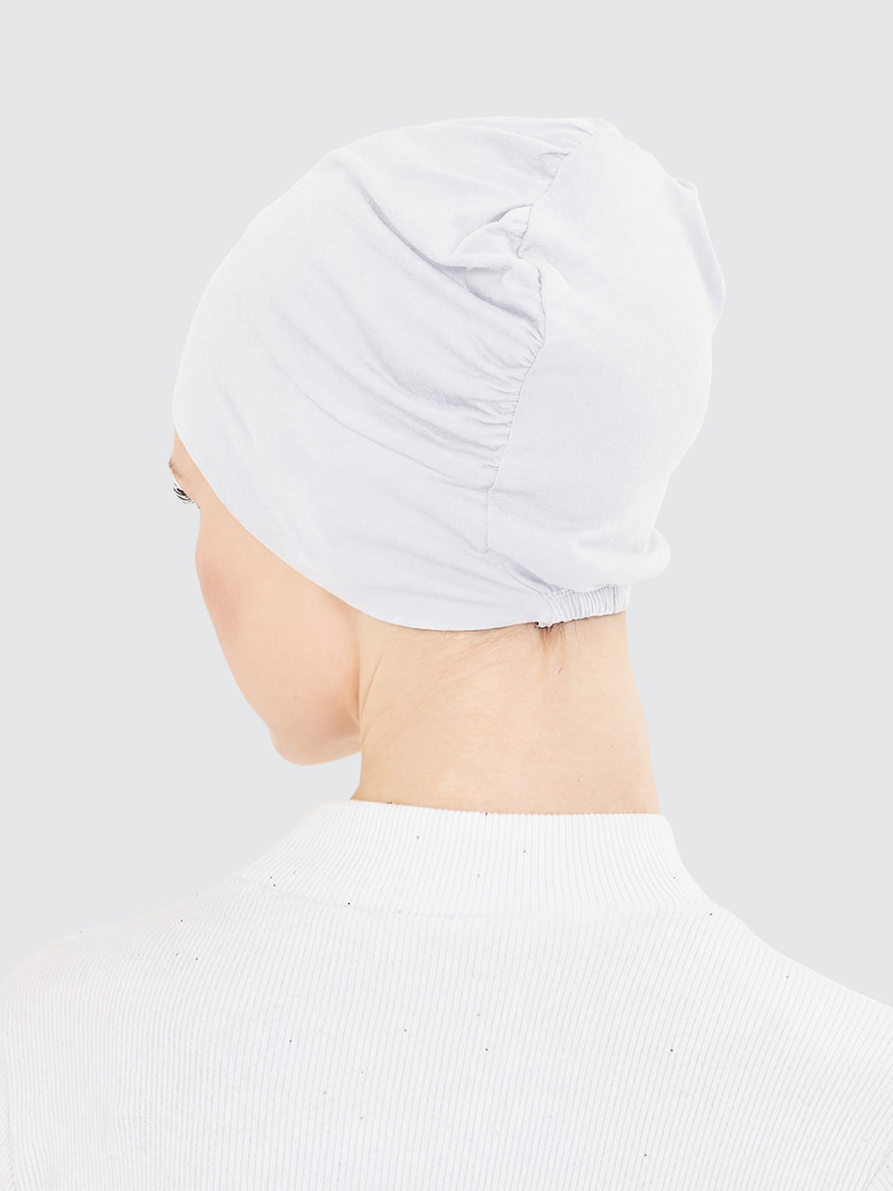 Imaarah white hijab undercap back view showing flexible gathered design