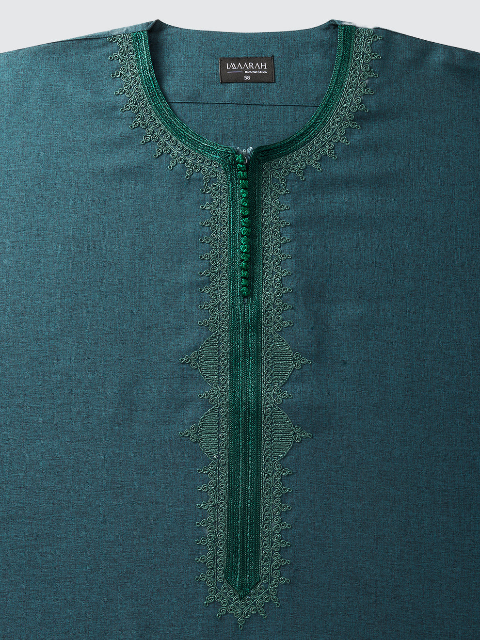 Close-up of Imaarah Qasr Moroccan Thobe neckline in Emerald Green