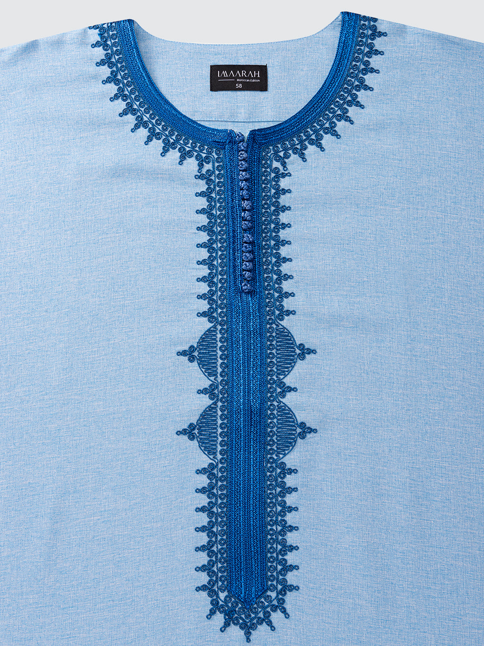 Close-up of Imaarah Qasr Moroccan Thobe neckline in Sky Blue with Royal Blue Moroccan embroidery