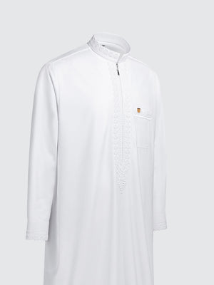 Luxury white Moroccan thobe featuring detailed imperial embroidery, refined long sleeve silhouette for formal Islamic wear and ceremonial occasions