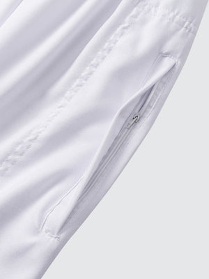 Close-up of Imaarah Andalus white pants side pocket with concealed zip for secure everyday wear