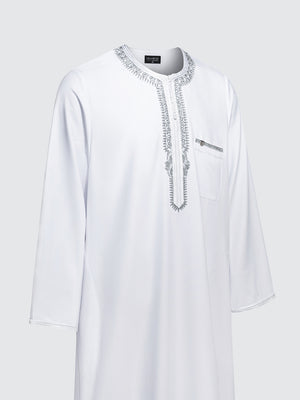 Side view of Imaarah Andalus long sleeve Moroccan thobe in white highlighting relaxed fit and grey embroidery detailing