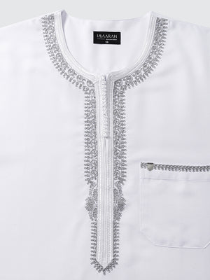 Top view of Imaarah Andalus Moroccan thobe neckline in white with detailed grey Moroccan embroidery