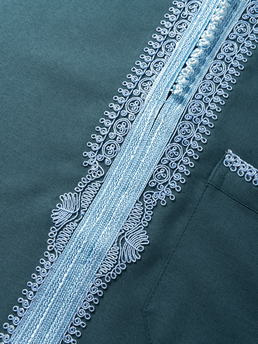 Sky blue Moroccan placket embroidery detail on emarald green long sleeve thobe