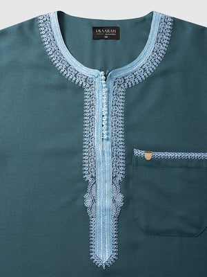 Sky blue Moroccan embroidery neckline detail on emarald green Andalus long sleeve thobe