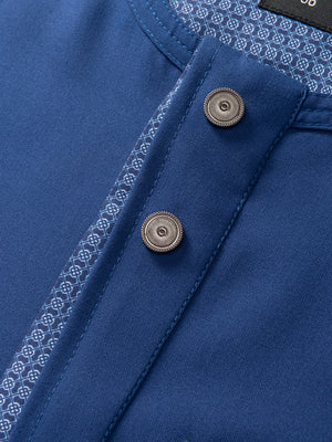 Imaarah Vantage navy short sleeve thobe, close-up detail of Imaarah premium buttons and fabric texture